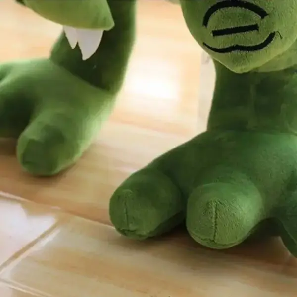 Kuscheltier T-Rex mit gestreiftem Schwanz und Zahnreihe – Bild 3