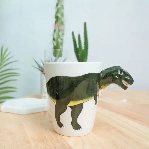 Keramiktasse mit plastischem Tierhenkel und Bemalung – Bild 8