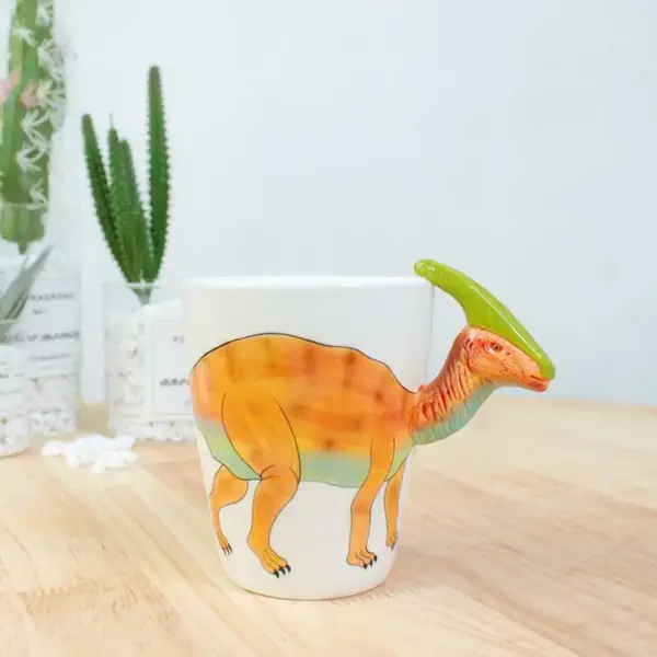 Keramiktasse mit plastischem Tierhenkel und Bemalung – Bild 7