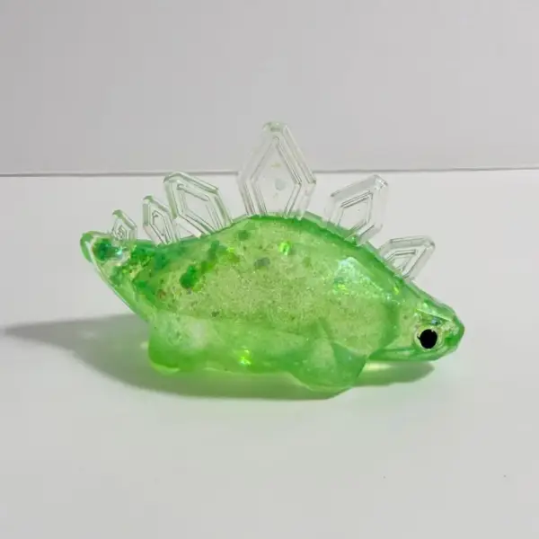 Dinosaurier Figur mit Glitzer und facettierter Optik – Bild 4